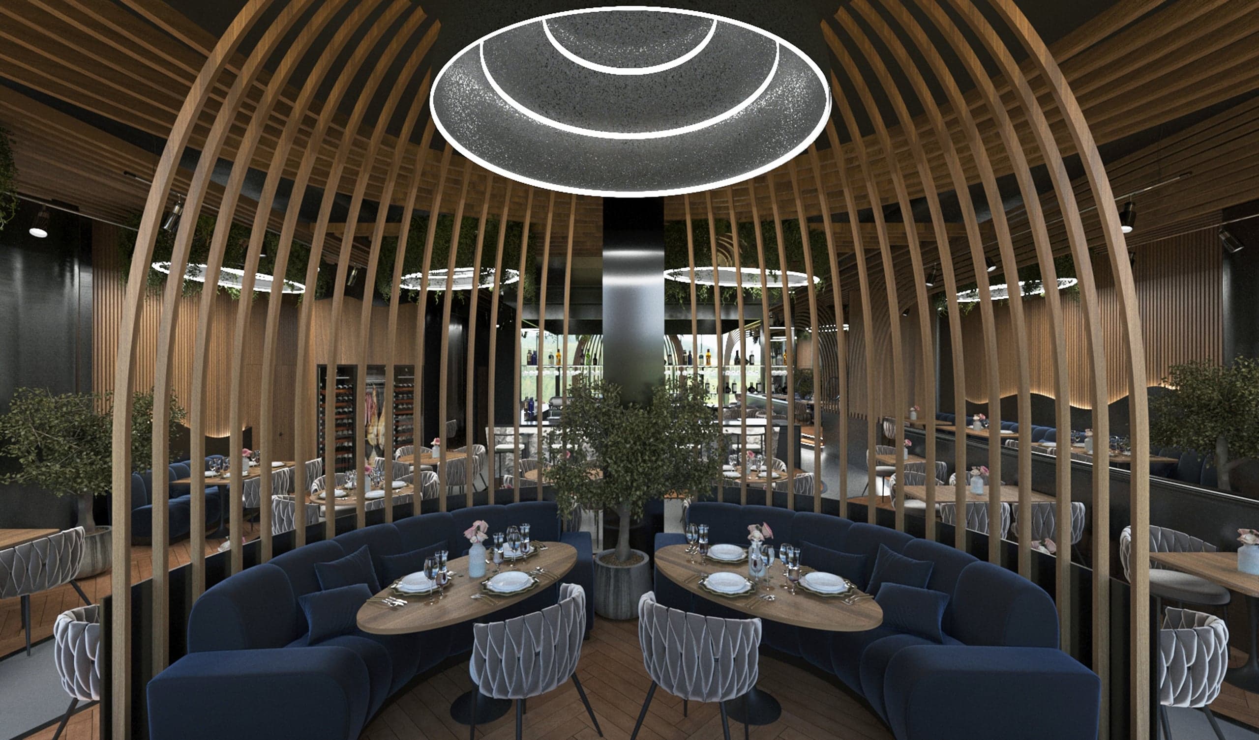Lounge circular cu canapele bleumarin în Restaurant L'Amour