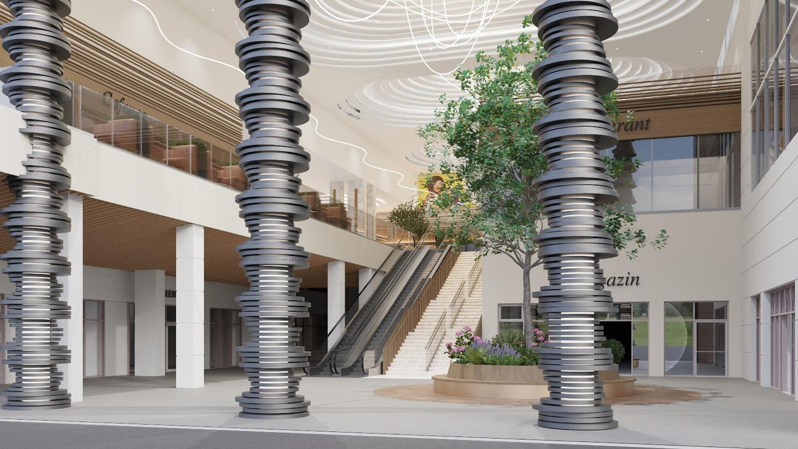 Atrium cu coloane decorative și escalatoare în Mall Ario