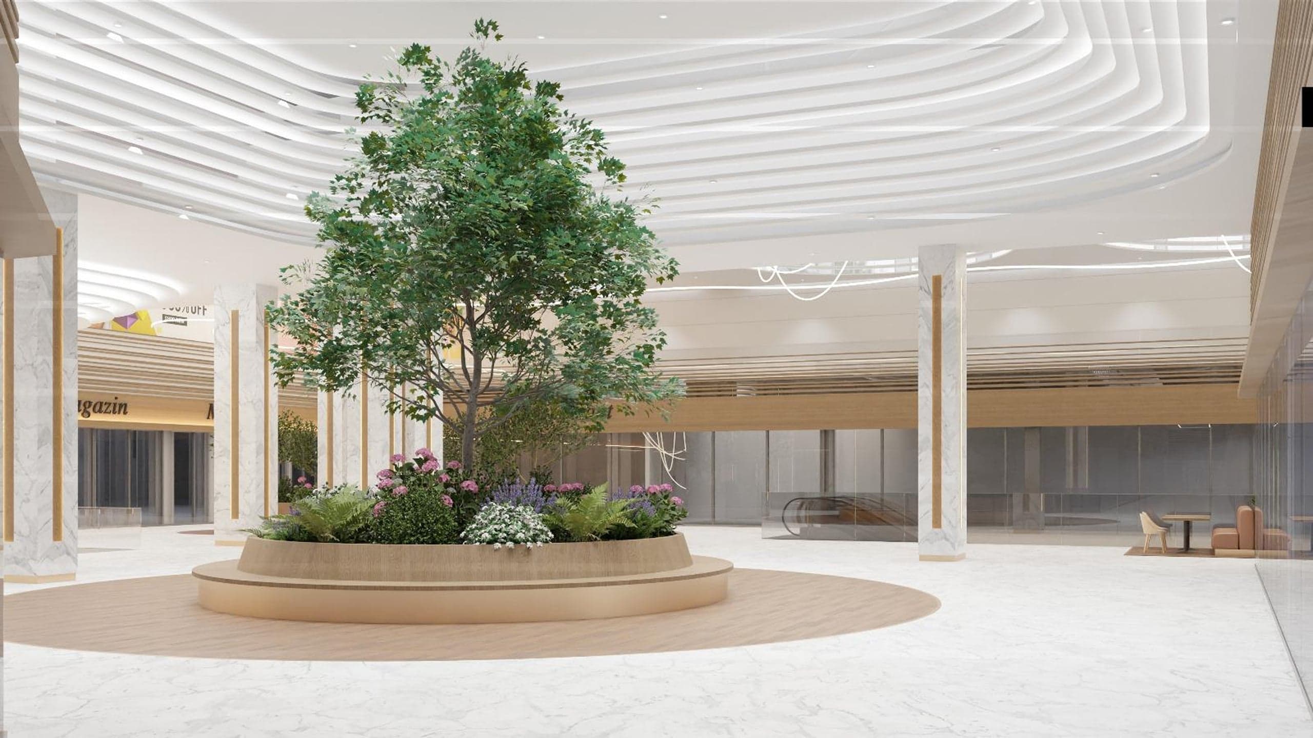 Atrium cu arbore central și planșeu luminos în Mall Ario