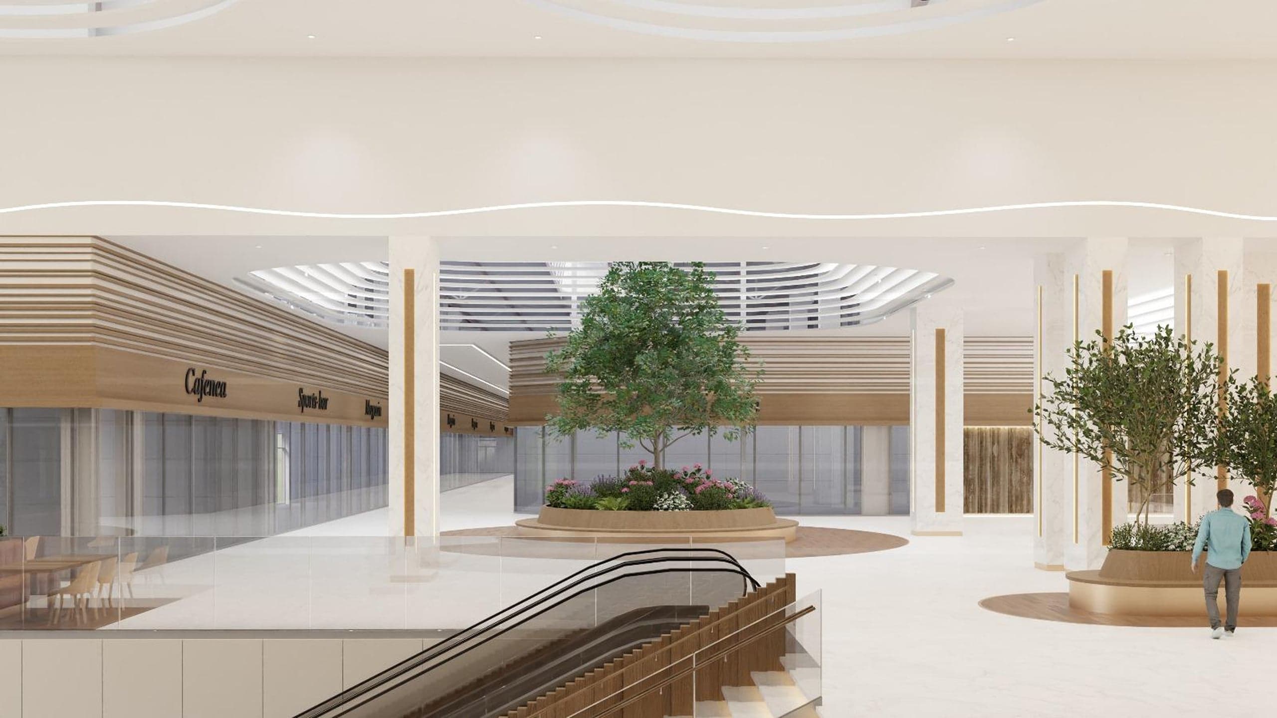 Atrium cu scări, verdeață și magazine în Mall Ario